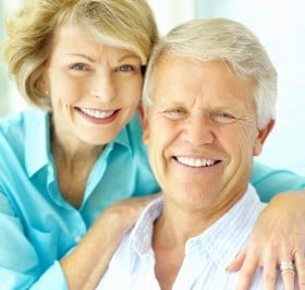 Couple buying whole life insurance Couple buying whole life insurance