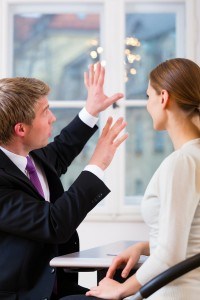 accuquote life insurance reviews, man holding both hands up trying to explain accuquote to woman