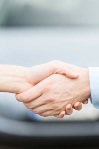 two people shaking hands