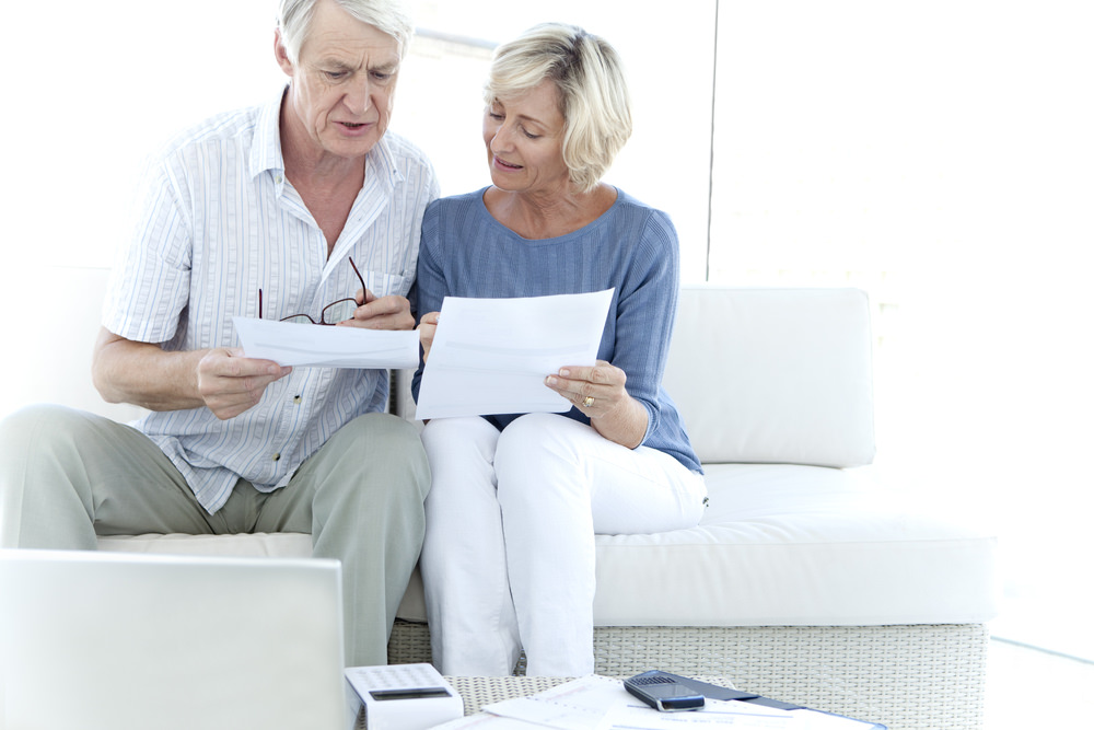 Senior couple discussing life insurance